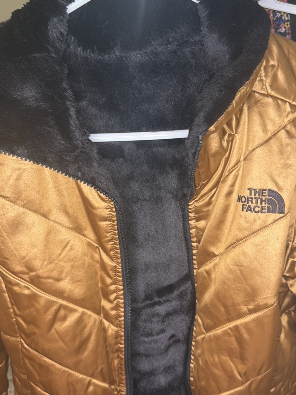 The North Face Women's Metallic Gold Puffer Jacket with Black Faux Fur